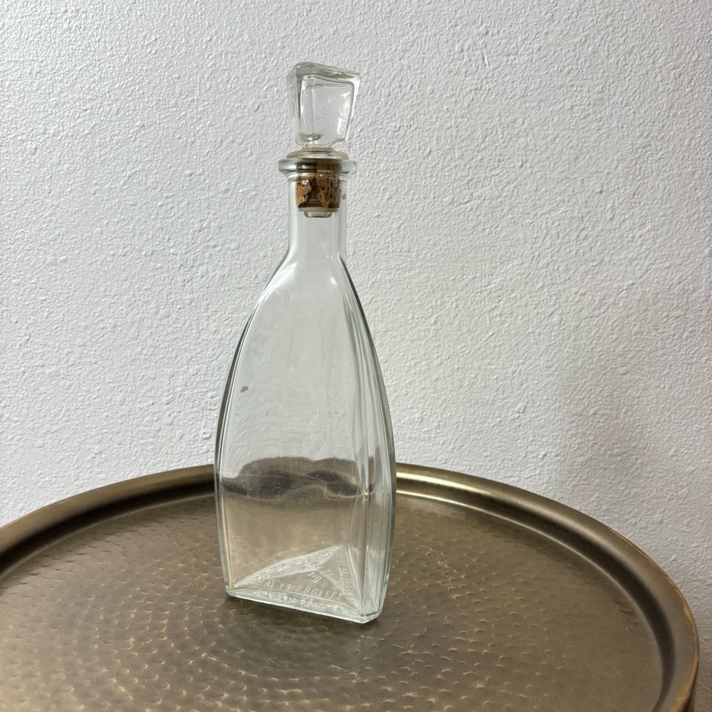 Vintage triangle shaped glass whiskey bottle with cap